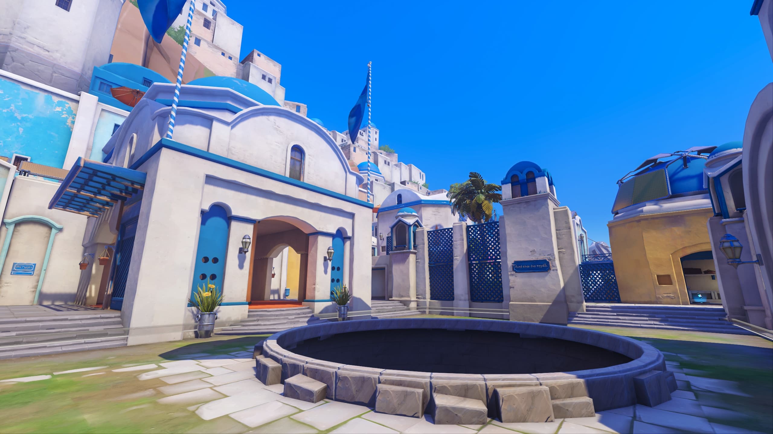 Casas blancas, cúpulas azules y pozo central de Ilios en Overwatch